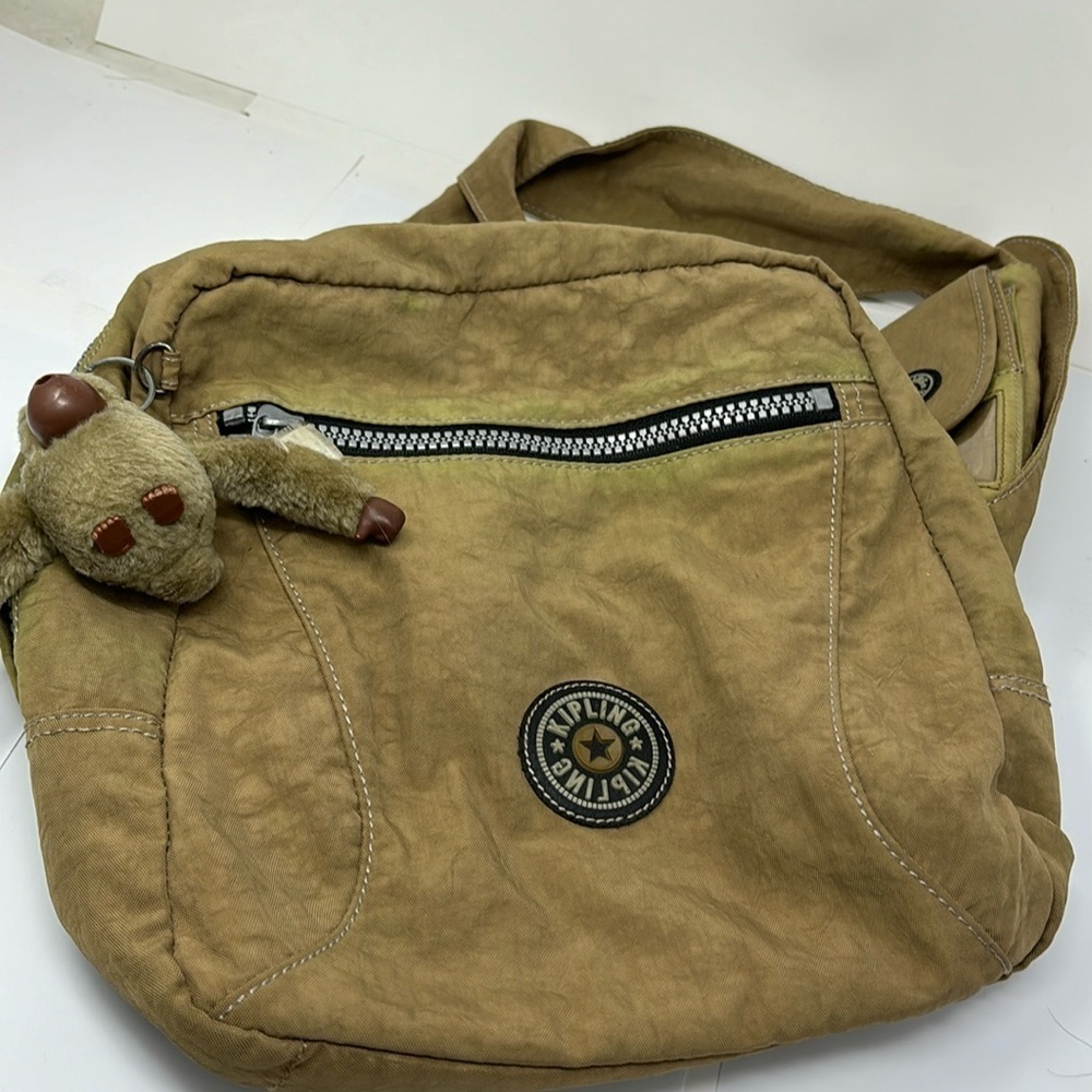 kipling Sports bag for carrying on the back with a crossed front loop